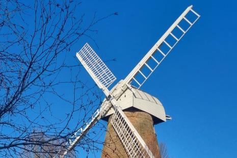 Rayleigh Windmill sails with blue sky in the background