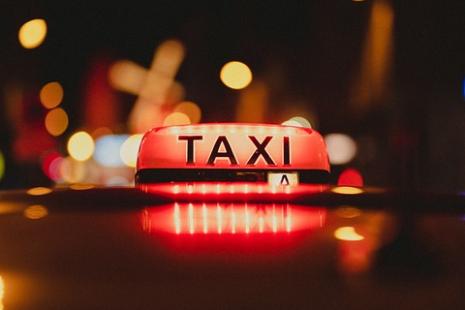 Close up of a lit taxi sign
