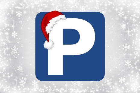 Parking sign with Santa hat